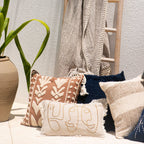 cushions with ladder and plant

