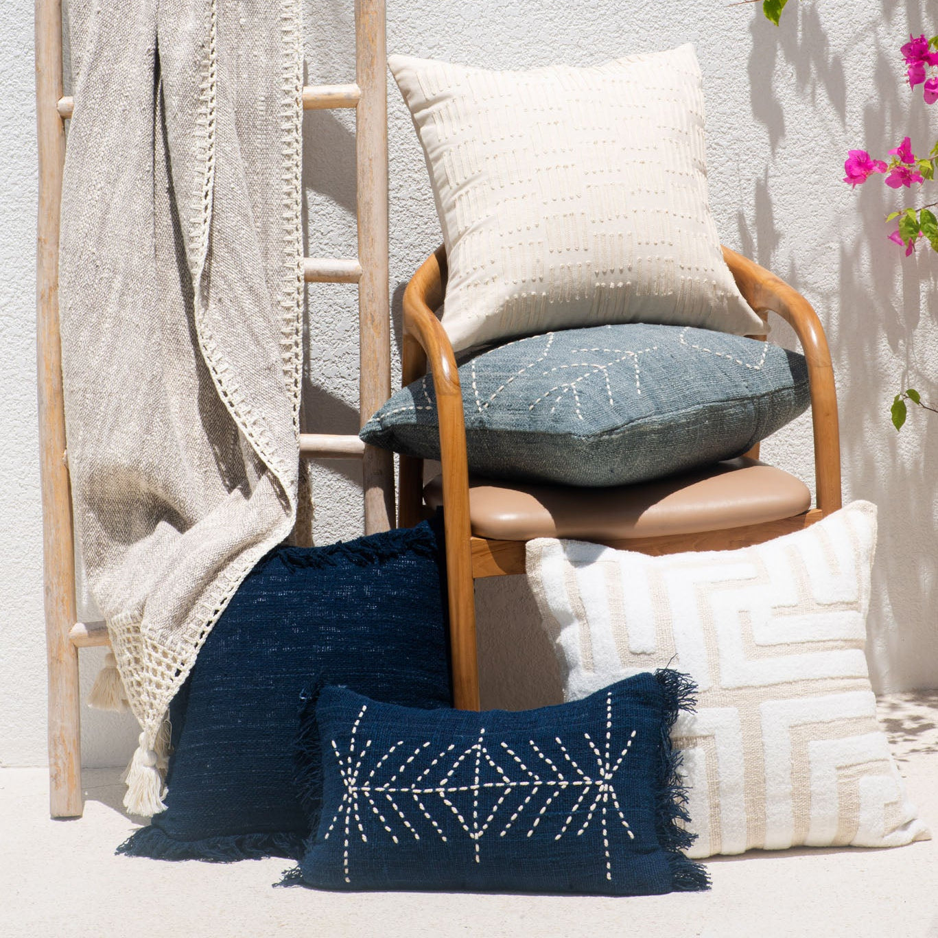 cushions with latter and flowers