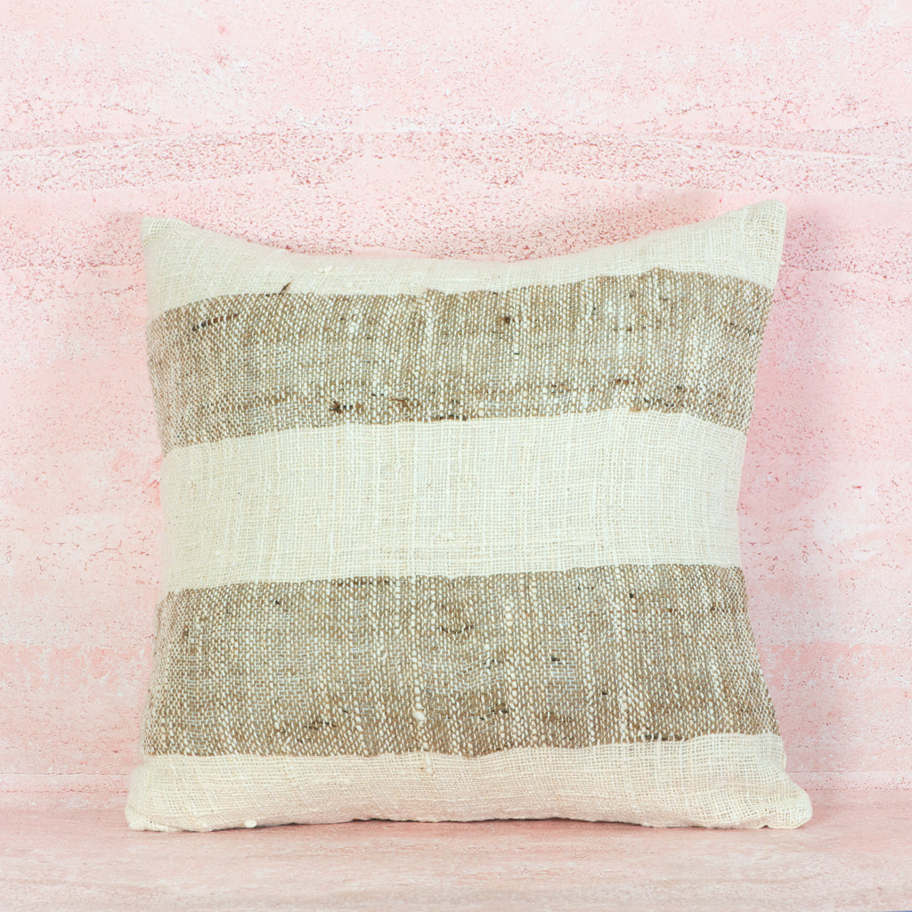 Textured pillow with horizontal stripes