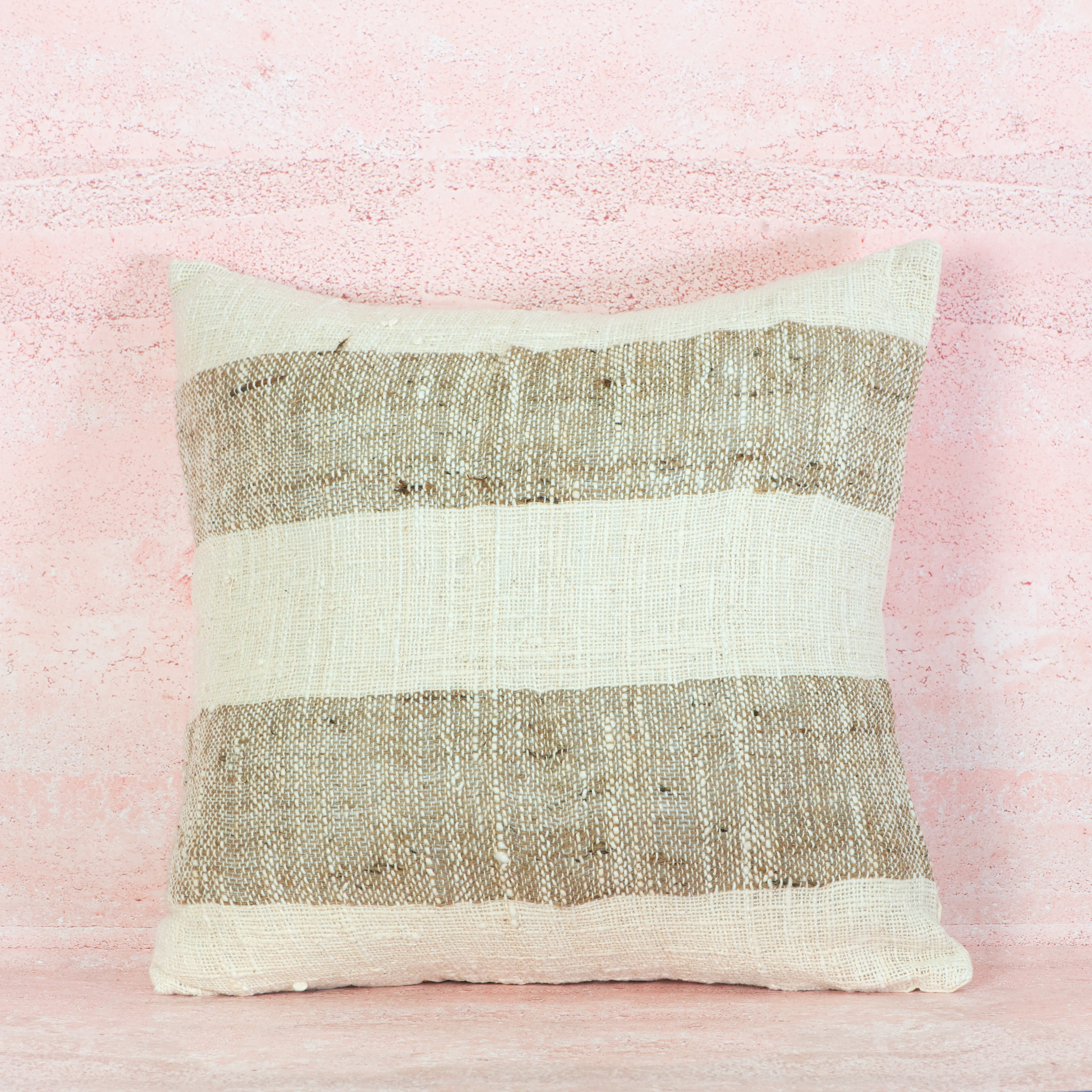 Textured pillow with horizontal stripes